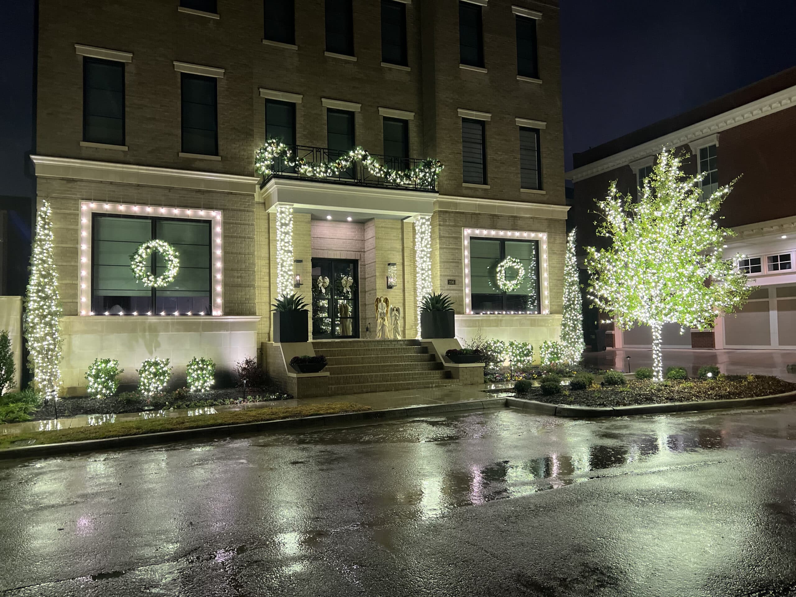 Townhouse in Southlake Town Center beautifully decorated with Christmas light packages.