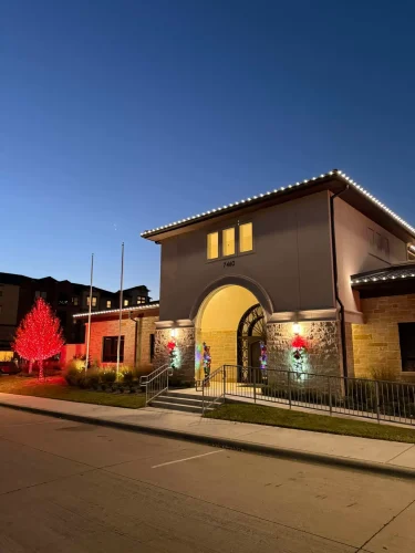 Commercial holiday light installation on a professionally managed property in Dallas-Fort Worth — Christmas Lights 4 U